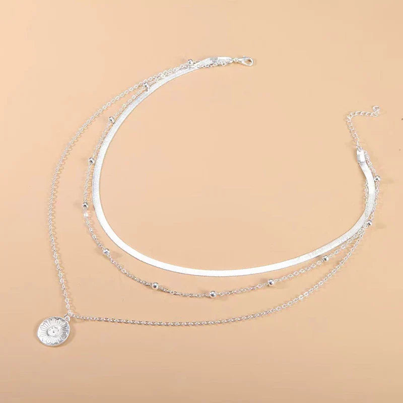 Collier Triple
