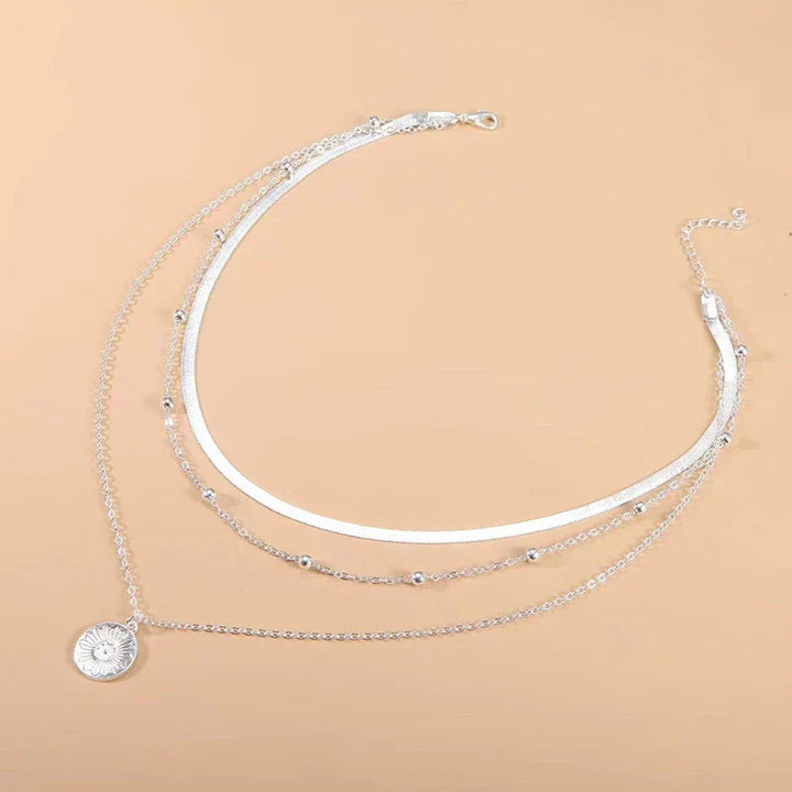 Collier Triple