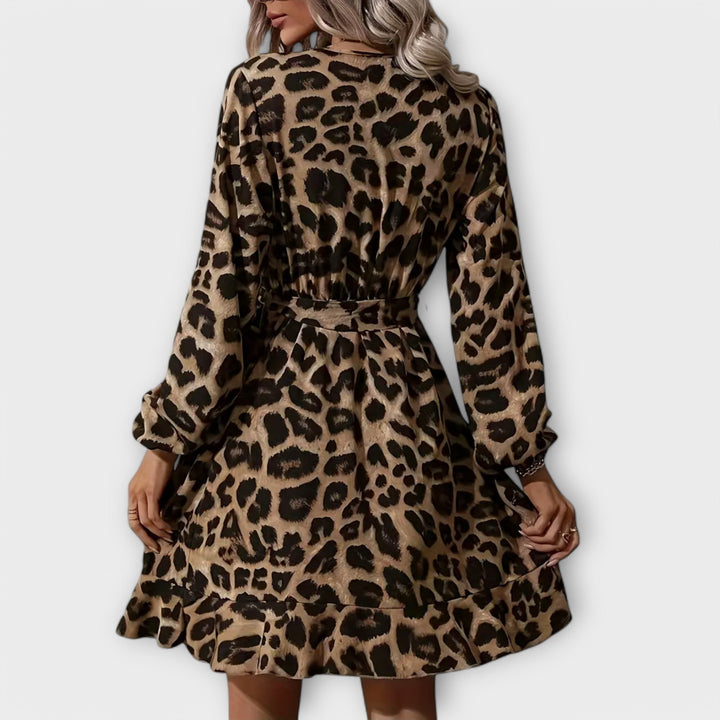 Robe élégante à imprimé léopard, décolleté en V et ceinture à nouer