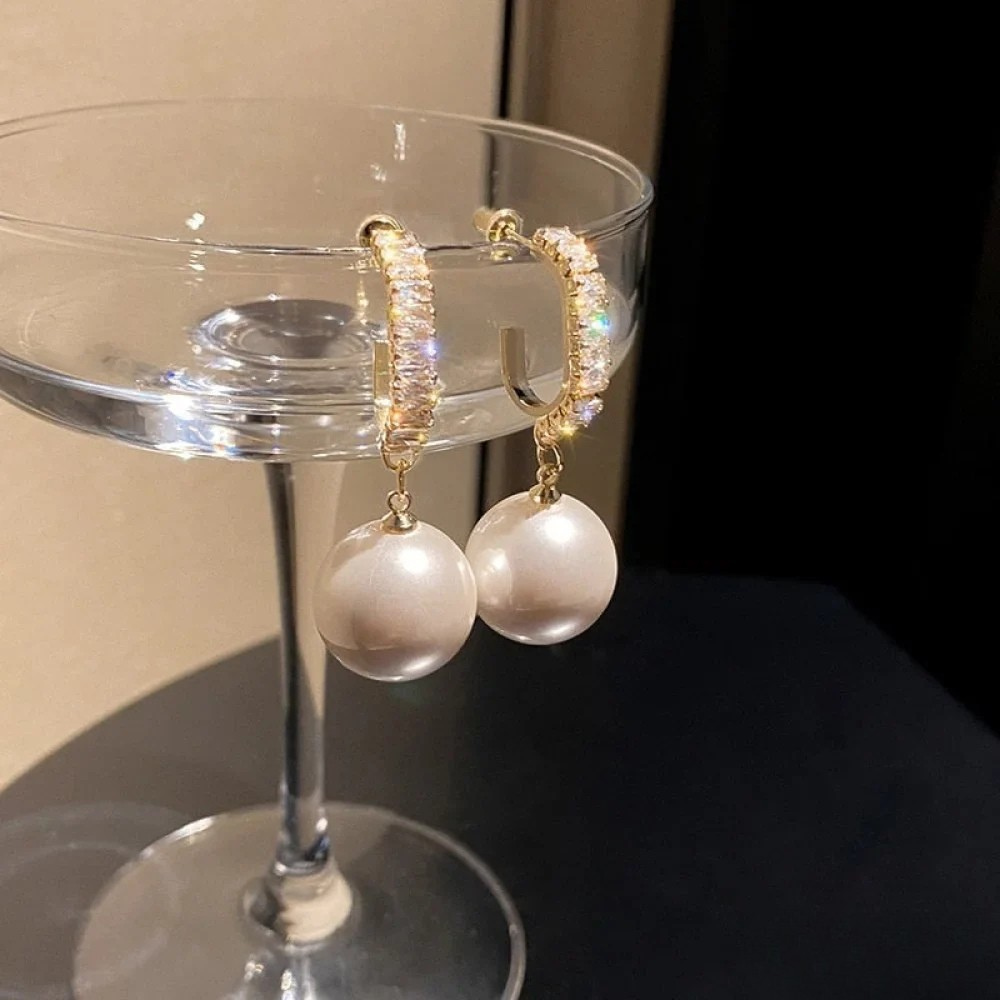 Boucles d'oreilles élégantes avec accents en perles