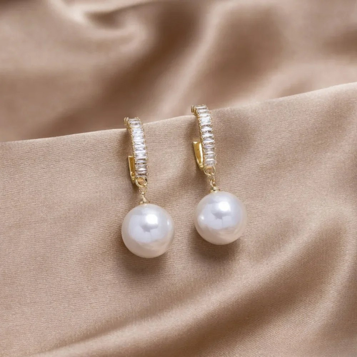 Boucles d'oreilles élégantes avec accents en perles