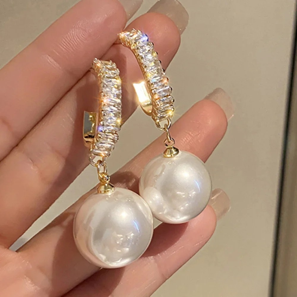 Boucles d'oreilles élégantes avec accents en perles