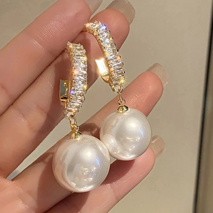 Boucles d'oreilles élégantes avec accents en perles